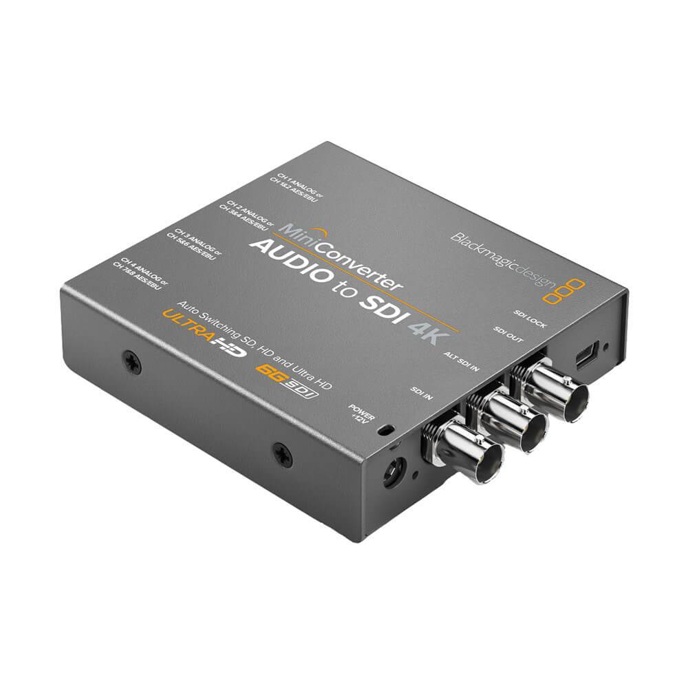 Blackmagic Design Mini Converter Audio to SDI 4K video converter with input and output ports, compact black device on a white background. – image 1