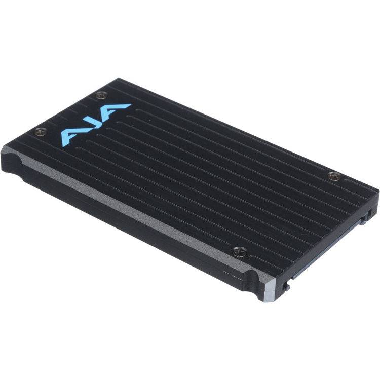 AJA Pak1000 1TB SSD storage module with black casing and connector ports, designed for high-performance data storage. – image 1