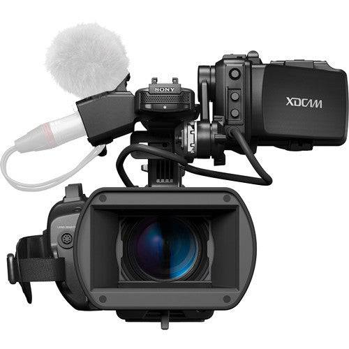 Sony PMW-300K1 handheld XDCAM HD camcorder with interchangeable lens system, front view showing lens and control buttons. – image 3