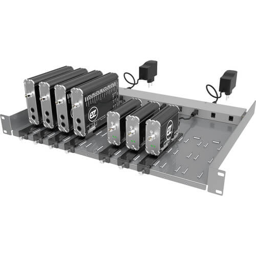 Lumantek rack mount converter on a sturdy rack shelf, showcasing professional audio and video equipment setup. – image 1