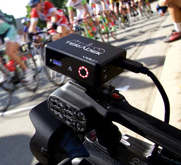 Teradek Vidiu Mini streaming encoder for production, featuring compact design and race scene footage. – image 1