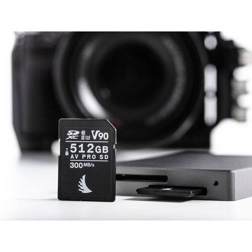 Angelbird 512GB AV Pro MK2 UHS-II SDXC memory card lying on a white surface, showcasing its storage capacity and compact design. – image 5