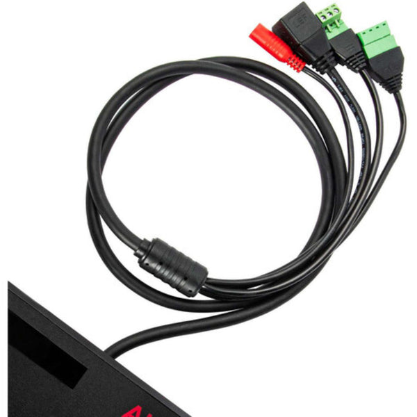 AIDA Imaging Compact VISCA Serial and IP PTZ Camera Controller with connected cables, compact design, and control ports visible. – image 2