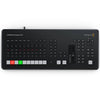 Blackmagic Design ATEM Mini Extreme ISO G2 video switcher with multiple control buttons and input ports on the front panel.