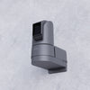 BirdDog O4 Outdoor camera mounted on a textured gray wall