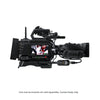Blackmagic Design URSA Cine 12K LF 100G cinema camera with large lens mount and professional controls in a studio setting.