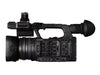 Canon XF605 UHD 4K HDR pro camcorder with professional lens and hand grip, ready for high-quality video recording.