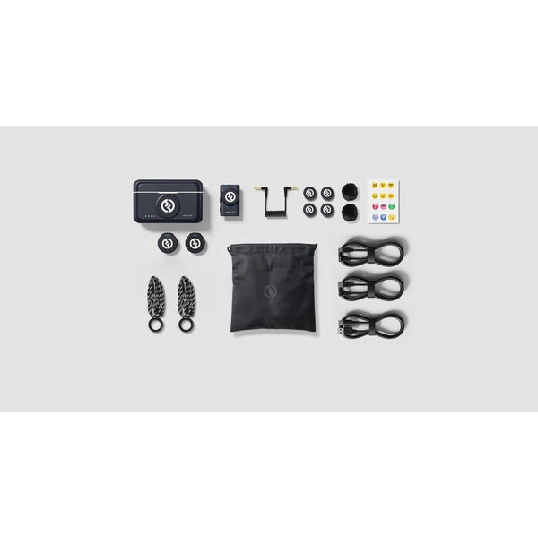 Hollyland LARK M2 wireless lavalier microphones duo set with Shine Charcoal finish, shown with camera equipment. – image 2