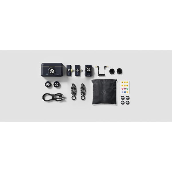 Hollyland LARK M2 wireless lavalier microphone combo in shine charcoal, showing complete production equipment setup and accessories. – image 2