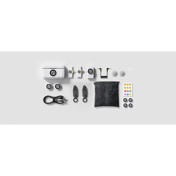 Hollyland LARK M2 wireless lavalier microphone combo in ivory white, showing the compact microphone and receiver set for production use. – image 2