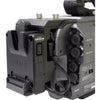 IDX System Technology A-DCFX9 V-Mount Adapter installed on Sony PXW-FX9 camera, showing the angled back view