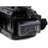 IDX System Technology SSL-JVC75 7350mAh battery mounted on a JVC camera, showcasing the high-capacity power source.