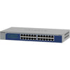 Front left isometric view of a Netgear 24-port Gigabit Ethernet unmanaged network switch with LED indicators and port labels.