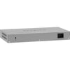 Rear right isometric view of Netgear 24-port Gigabit Ethernet unmanaged network switch with multiple ports and ventilation.