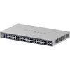 Front right view of Netgear GS752TXv3 48-port Gigabit managed network switch showing ports and LED indicators.