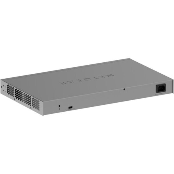 Rear left view of Netgear GS752TXv3 48-port Gigabit managed network switch showing ports and connection panel. – image 5