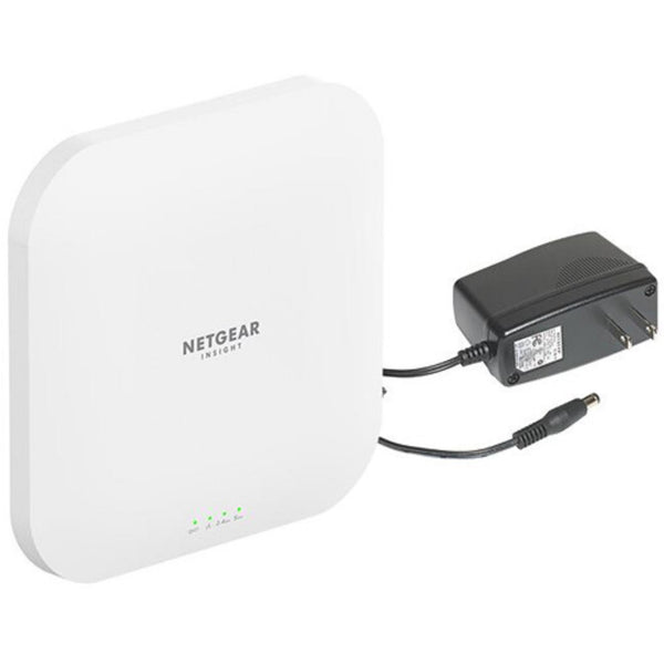 Netgear WAX620PA AX3600 dual-band wireless access point with power adapter, shown from front left perspective. – image 2