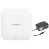 Netgear WAX620PA AX3600 dual-band wireless access point with 2.5 Gigabit Ethernet ports and power adapter, front view.