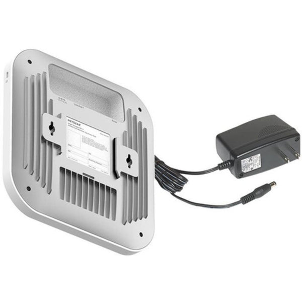 Rear left view of Netgear WAX620PA AX3600 wireless dual-band access point with Power over Ethernet port and ventilation. – image 5