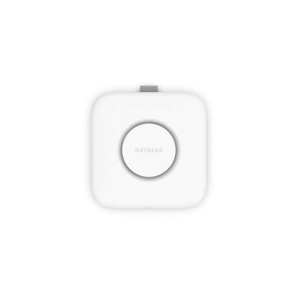 Top view of Netgear Cloud Managed WiFi 7 Access Point, a sleek wireless access point with multiple antennas and Ethernet ports. – image 1