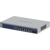 Rear left angle view of Netgear XS508TM 8-port 10G managed network switch with ports and connection panels visible