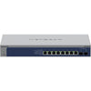 Rear right angle view of Netgear XS508TM 8-port 10G managed network switch showing ports and Ethernet connections