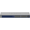 Front view of Netgear XS724TM 24-port 10G managed network switch showing ports and LED indicators.