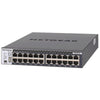 Netgear M4300-24X managed 24-port 10G network switch with SFP+ ports, front-left isometric view.