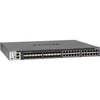 Netgear M4300-24X24F managed network switch with 24 RJ45 ports and 24 SFP+ 10G ports, front right angle view.