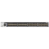 Front view of Netgear M4300-24X24F managed network switch with 24 RJ45 ports and 24 SFP+ 10G ports on a sleek black device.
