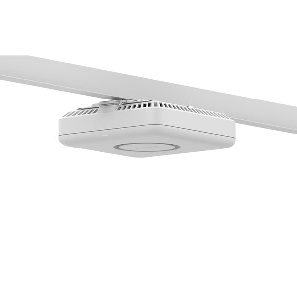 Netgear WBE758 Tri-Band WiFi 7 wireless access point mounted on a wall with T-bar installation hardware. – image 10
