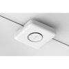 Netgear WBE758 Tri-Band WiFi 7 wireless access point mounted on ceiling, sleek design for seamless internet coverage