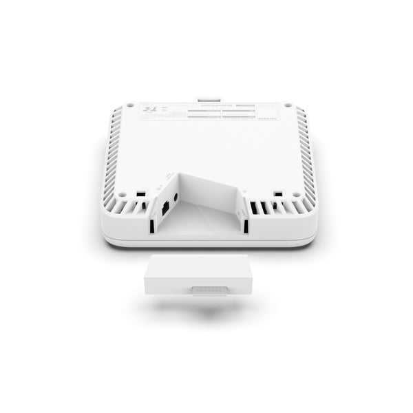 Rear view of the open Netgear WBE758 Tri-Band WiFi 7 Access Point showing its sleek design and ports. – image 16