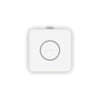 Netgear WBE758 Tri-Band WiFi 7 wireless access point with sleek top view showing antennas and design features.