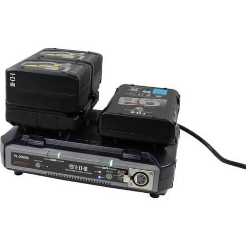 IDX System Technology A-Vmicro2 dual V-mount hot-swap plate for Imicro batteries, shown connected to a professional video camera. – image 3