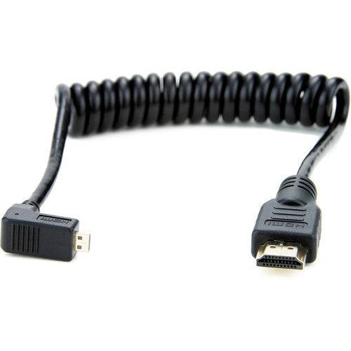 Atomos right-angle micro to full HDMI coiled cable, 11.8 to 17.7 inches, used for connecting HDMI devices with flexible length – image 1