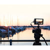 Atomos Shogun 4K HDMI/12G-SDI video monitor with 7-inch screen, used for professional video recording and monitoring.