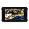 Atomos Shogun Classic 7-inch HDR video monitor recorder switcher displaying a live video feed with controls and interface.