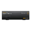 Blackmagic Design Teranex Mini Audio to SDI 12G Converter front view, compact video converter with audio and SDI connection ports.
