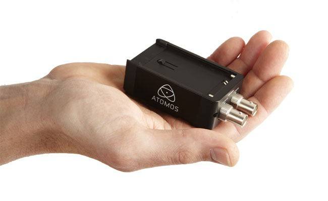 Atomos Connect Battery Converter H2S converts HDMI to SDI, shown in hand for portable video conversion and professional video equipment use. – image 5