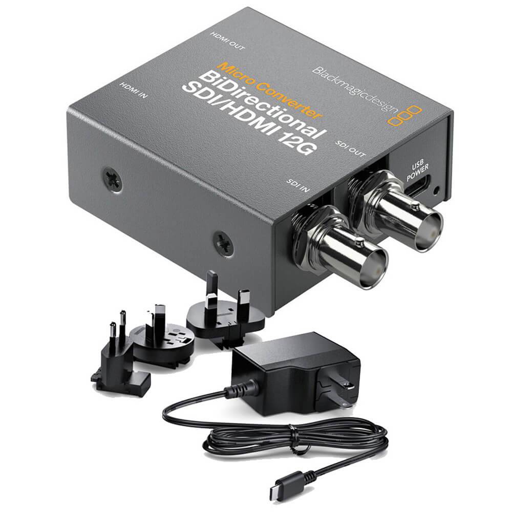 Blackmagic Design bi-directional SDI and HDMI 12G micro video converter with power supply connected, compact device for professional video. – image 1