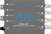 AJA FiDO-4T-X quad-channel 3G-SDI to LC fiber video converter with four SDI input ports and fiber optic output connectors.