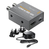 Blackmagic Design HDMI to SDI 12G micro video converter with power supply, compact device for professional video signal conversion.