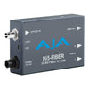 AJA Hi5 Fiber HD/SD-SDI to HDMI mini-converter connected to a video setup, showcasing compact design and connection ports.