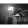 Sony HXR-NX5R Full HD professional camcorder with 40x zoom and built-in wireless, shown in a well-lit shot.