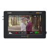 Blackmagic Design Video Assist 5-inch 12G HDR video monitor displaying a live video feed with interface controls.