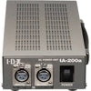 IDX System Technology IA-200a 100W AC adapter power supply for video cameras, with a compact design and power cable included.
