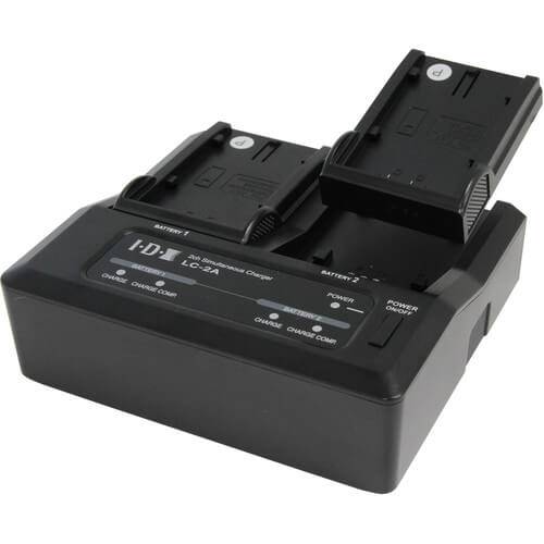 IDX System Technology LC-2A 7.4V battery charger with interchangeable plates for video cameras, shown from top view. – image 1
