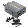 Blackmagic Design SDI to HDMI 12G Micro Converter with power supply showing compact video converter device with cables