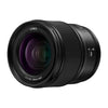 Panasonic Lumix S 24mm f/1.8 L-Mount lens with front element and aperture blades visible, designed for mirrorless camera photography.